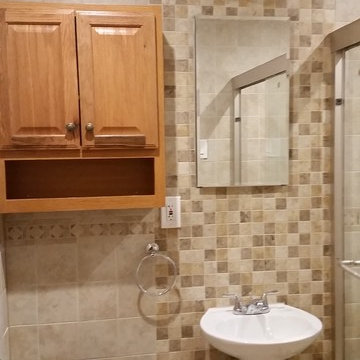 Standard 5'x7' bathroom transformation in the apartment building.