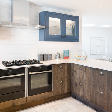 Industrial Rustic kitchen with doors made from 100 year old Reclaimed  wood.