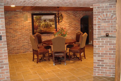 Example of a large classic travertine floor and beige floor enclosed dining room design in Philadelphia with red walls