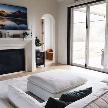 Organic Modern Living Room with Fireplace and Bi-Fold Doors | Transitional Moder