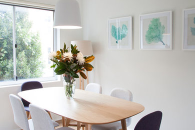 This is an example of a nautical dining room in Sydney.