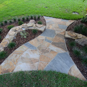 Natural Stone Dry-Stack Retaining Walls with Dry-Laid Stone Pathways