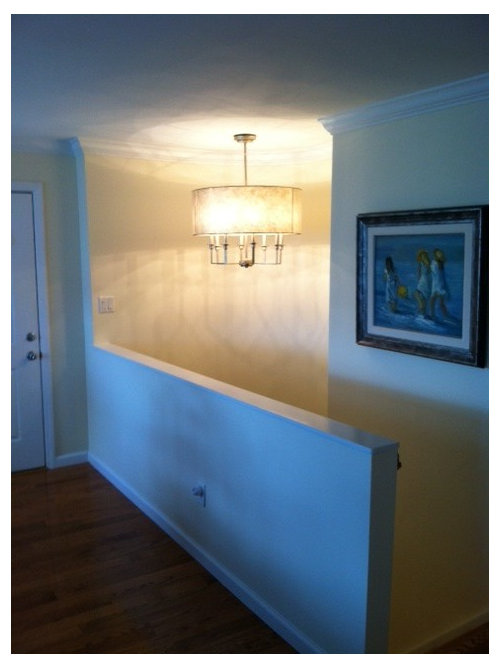 How do I reach a high light fixture?