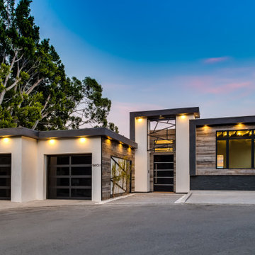 Full Street Elevation Lit from the Soffits at Twilight