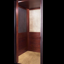 Raised Panel, Wire Mesh & Leather Hide Elevator - Products