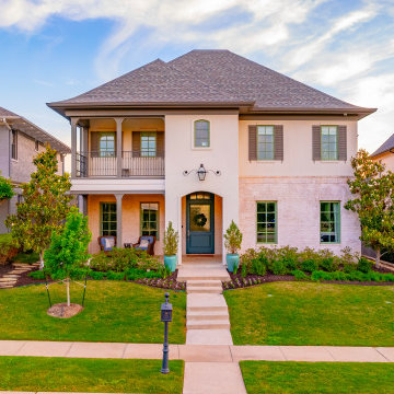 Elegant Home Remodel with Lush Landscaping and Inviting Curb Appeal