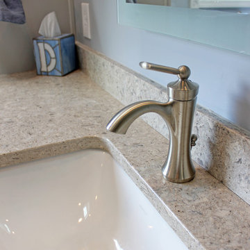 Gray Vanity with Freestanding Tub and Tiled Walkin Shower