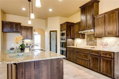 Example of a transitional kitchen design in Austin