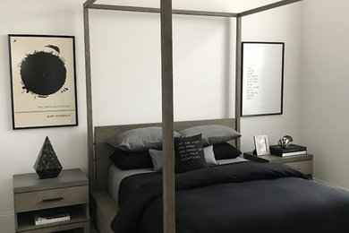 Example of a transitional bedroom design in Miami