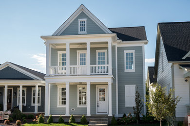 Elegant gray two-story exterior home photo in Louisville