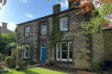 This is an example of a large victorian two floor front detached house in Other.