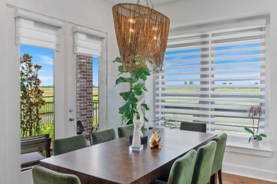 Inspiration for a large transitional dark wood floor kitchen/dining room combo remodel in Houston with white walls
