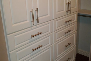 Example of a trendy closet design in Other