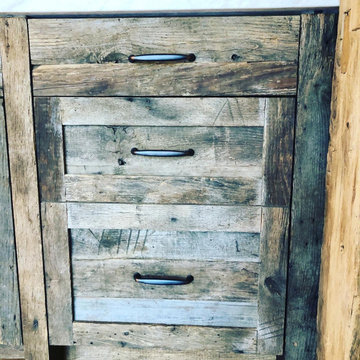 Custom built bar utilizing 220 year old reclaimed barn beams