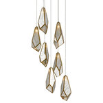 Currey & Company - Glace 7-Light Multi-Drop Pendant - The faceted shades of the Glace 7-Light Multi-Drop Pendant are made of panes of Raj mirror joined with seams of metal in a brass finish. The organic shape of the shades and the fact they hang at differing heights brings this mirrored pendant added personality that will make it a piece of jewelry in a space. This fixture is among Currey & Company's introduction of cluster lights, which includes 1-light up to 36-light configurations.