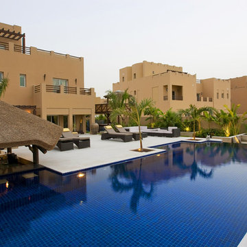 Thatch & timber is the is the focal point of this beautifully landscaped garden