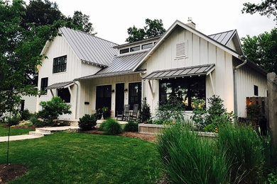 Inspiration for a farmhouse exterior home remodel in St Louis