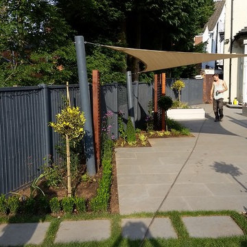 Hot tub garden with sail sheet