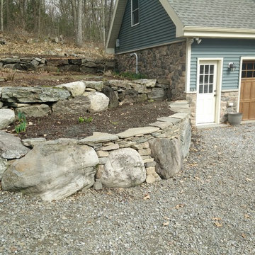 Semi-Dry laid retaining wall on exisiting boulders
