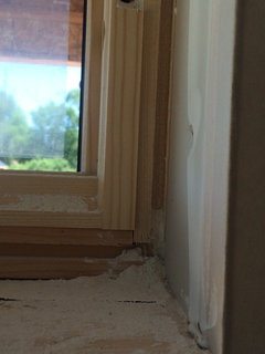 Drywall return for a wood window