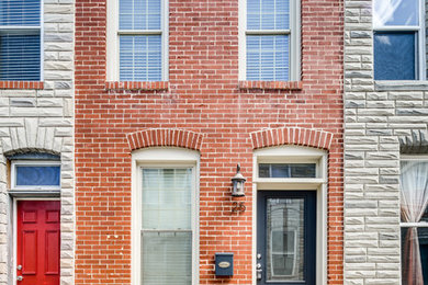 Example of a minimalist exterior home design in Baltimore