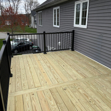 Pressure Treated Wood Deck with black powder coated rail