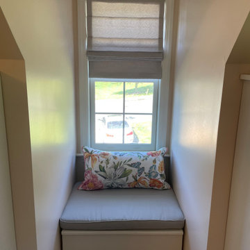 Cordless Roman shades and custom seat cushions for dormer windows