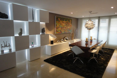 Dining room - large modern travertine floor dining room idea in Madrid with white walls and no fireplace