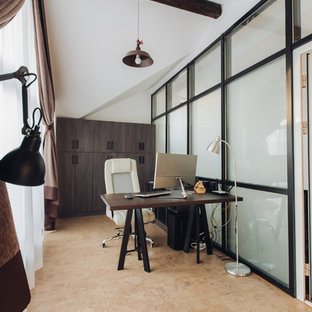 Small industrial study room in Other with white walls, cork floors, no fireplace, a freestanding desk and brown floor.