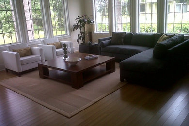 Example of a trendy living room design in Charleston