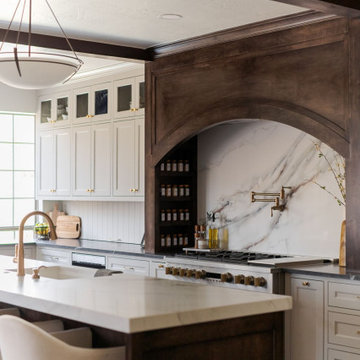 Painted Inset Cabinetry and Leathered Granite in a Transitional Edmond Kitchen