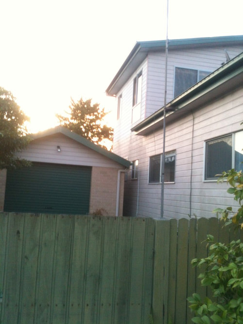 Exterior paint colours for house with green tin roof