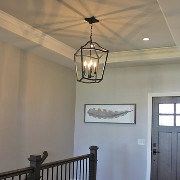 Aspen Homes- Antique White painted cabinets with Gray Stained Accents