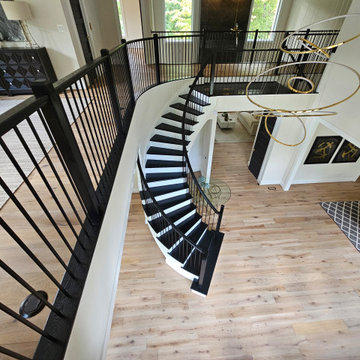 Project #130 | Curved Staircase with Wraparound Balcony