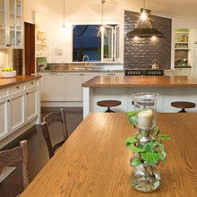 Stove top on the wall at the end of counter