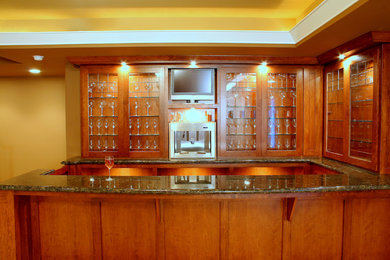 This is an example of a mid-sized arts and crafts home bar in San Francisco.