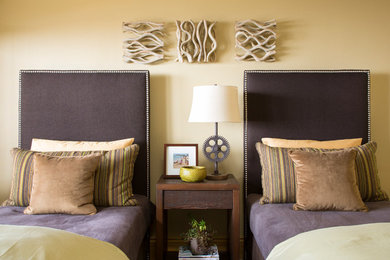 Transitional guest bedroom photo in Denver with beige walls
