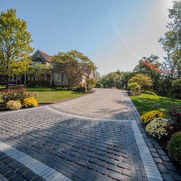 Curb-Appeal Driveway with Cobblestone Entrance