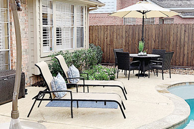 Inspiration for a large timeless backyard patio remodel in Houston