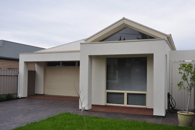This is an example of a small contemporary one-storey exterior in Adelaide.
