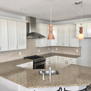 Maple cabinets finished in Ballet White