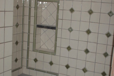 Inspiration for a mid-sized timeless master black and white tile and porcelain tile bathroom remodel in Milwaukee