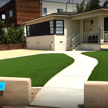 Artificial Grass Installation Between Concrete