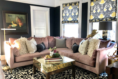 Example of a mid-sized transitional living room design in Chicago with blue walls