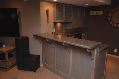 Example of a home bar design in Other