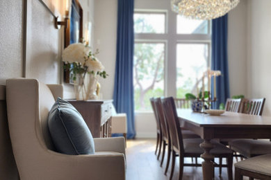 Example of a large transitional light wood floor and beige floor great room design in Austin with beige walls