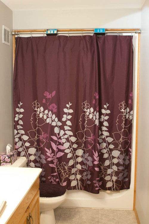 How do I hang my shower curtain?