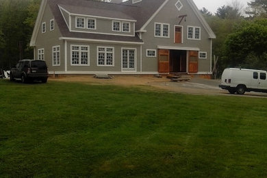 Example of a mountain style home design design in Boston