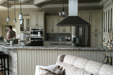 Example of a transitional kitchen design in New York