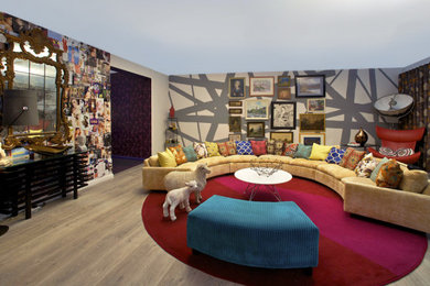 This is an example of an eclectic living room in Dublin with multi-coloured walls, laminate floors and recessed.